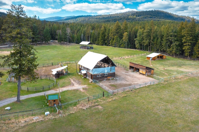 bird's eye view featuring a mountain view and a rural view