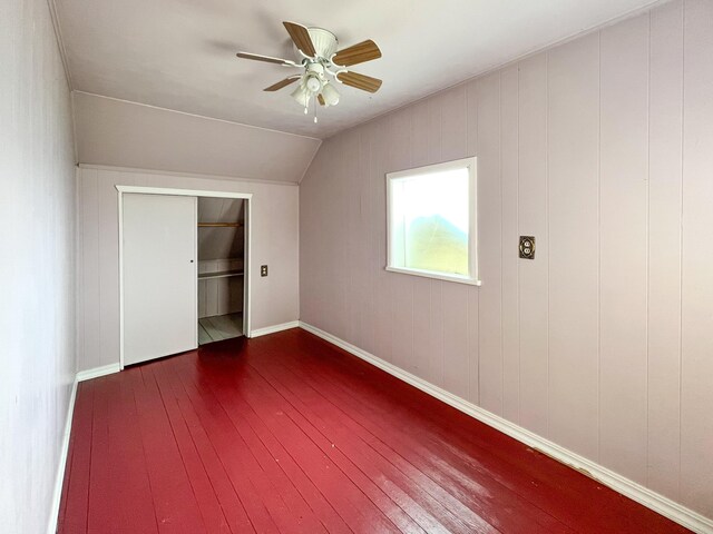 bonus room featuring vaulted ceiling, ceiling fan, and hardwood / wood-style flooring