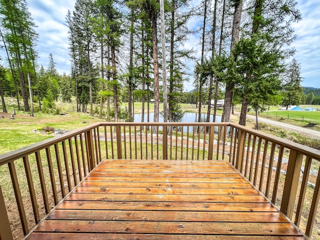 deck featuring a water view