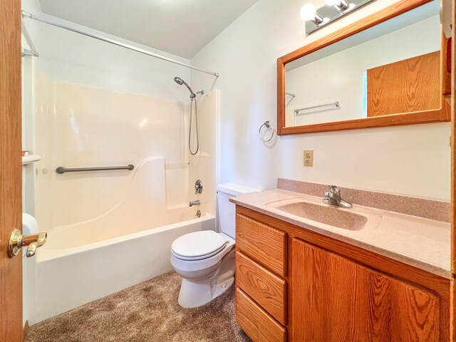 full bathroom featuring toilet, vanity, and  shower combination