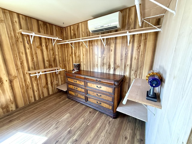3305 Bradeen Rd, Rice, WA 99167 - walk in closet with a wall mounted air conditioner and wood finished floors