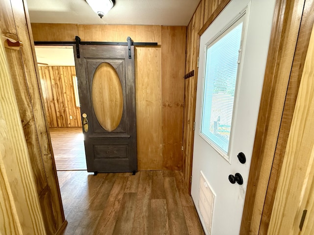 3305 Bradeen Rd, Rice, WA 99167 - doorway to outside with wooden walls and wood finished floors
