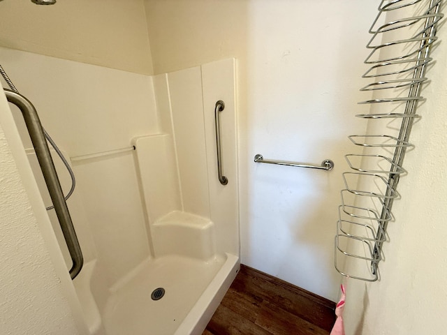 3305 Bradeen Rd, Rice, WA 99167 - bathroom featuring wood finished floors and a shower