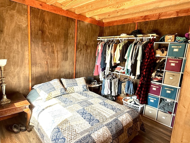 3305 Bradeen Rd, Rice, WA 99167 - bedroom featuring wood finished floors, a closet, and wood walls