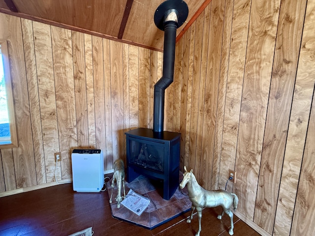 3305 Bradeen Rd, Rice, WA 99167 - detailed view of a wood stove, wood walls, and wood finished floors