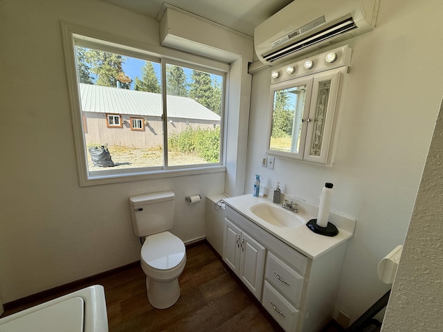 3305 Bradeen Rd, Rice, WA 99167 - bathroom featuring an AC wall unit, vanity, and wood finished floors