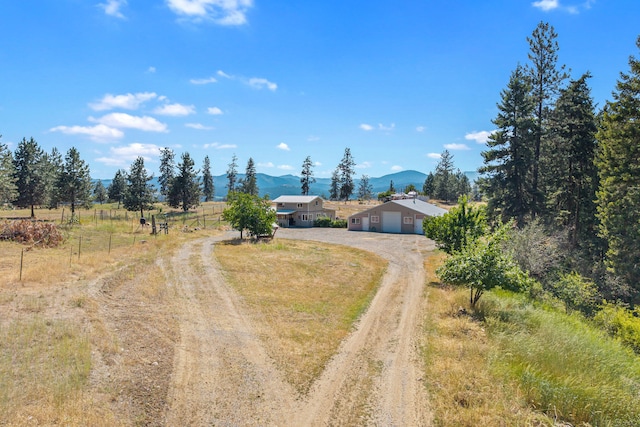3305 Bradeen Rd, Rice, WA 99167 - aerial view of sparsely populated area with a mountain backdrop