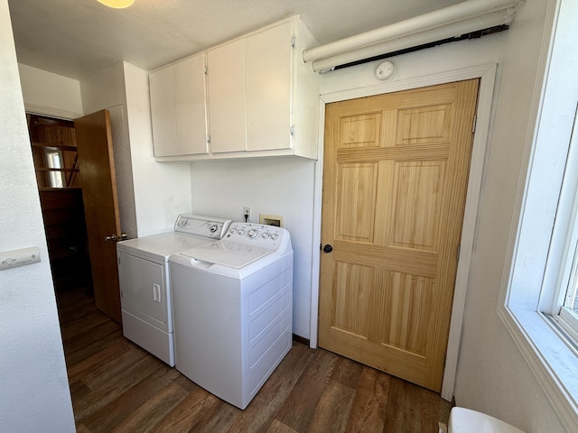 3305 Bradeen Rd, Rice, WA 99167 - laundry area featuring cabinet space, dark wood-type flooring, and washer and clothes dryer