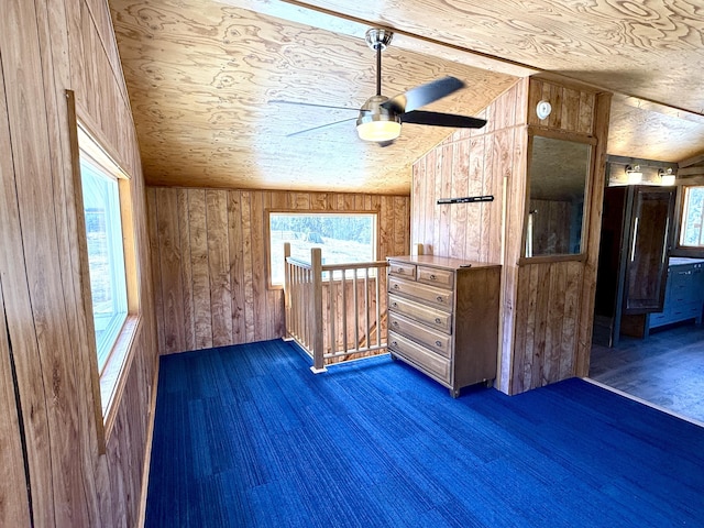 3305 Bradeen Rd, Rice, WA 99167 - additional living space featuring wood walls, a ceiling fan, healthy amount of natural light, and vaulted ceiling