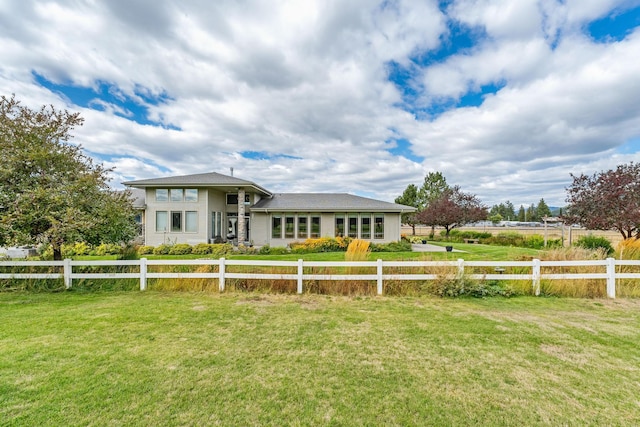 view of front of home with a front lawn