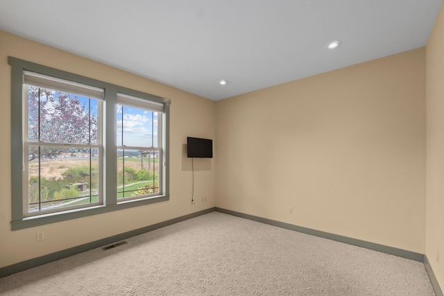 view of carpeted spare room