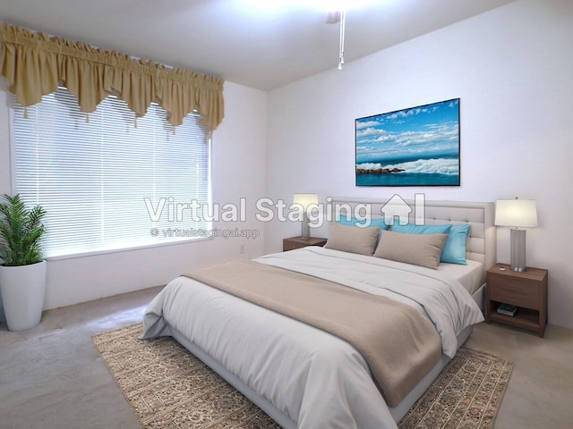 bedroom with multiple windows