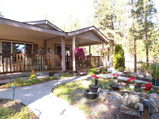 exterior space featuring covered porch