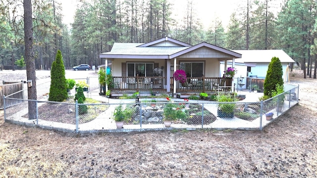 17 Crestview Dr, Kettle Falls, WA 99141 - view of front facade featuring covered porch