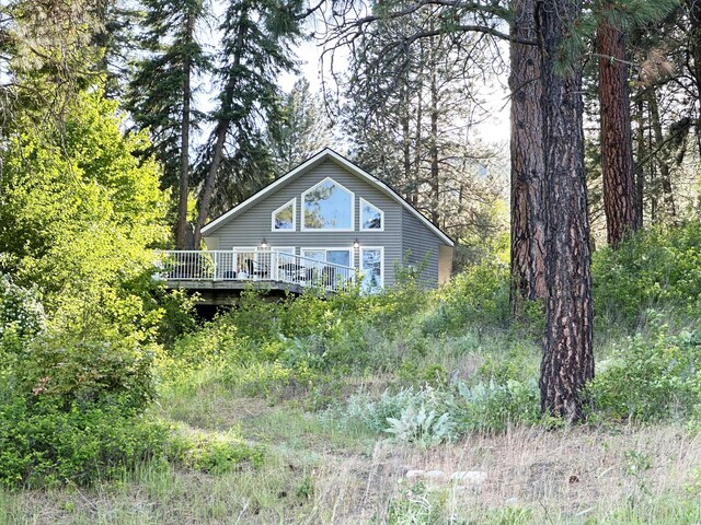2122 Northport Flat Creek Rd, Kettle Falls, WA 99141 - view of front of home with a deck