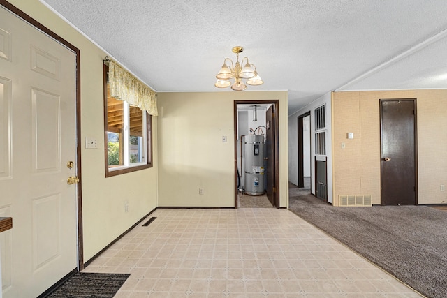 505 W Court Ave, Chewelah, WA 99109 - foyer entrance with water heater, a chandelier, a textured ceiling, baseboards, and light floors