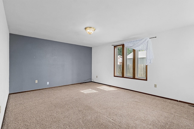 505 W Court Ave, Chewelah, WA 99109 - carpeted spare room with baseboards