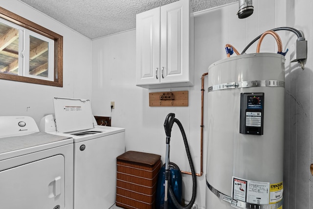 505 W Court Ave, Chewelah, WA 99109 - washroom with strapped water heater, cabinet space, washer and clothes dryer, and a textured ceiling