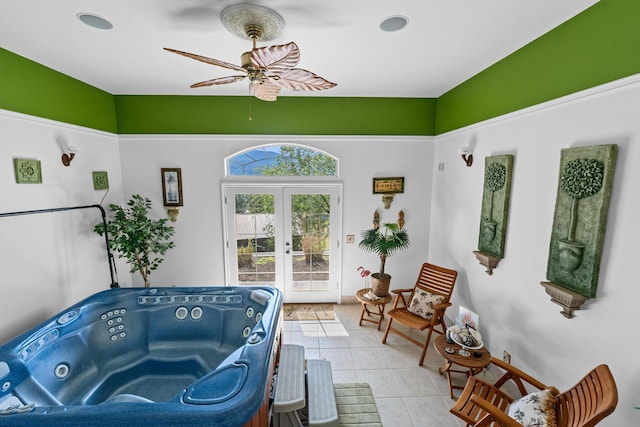 interior space featuring ceiling fan and french doors