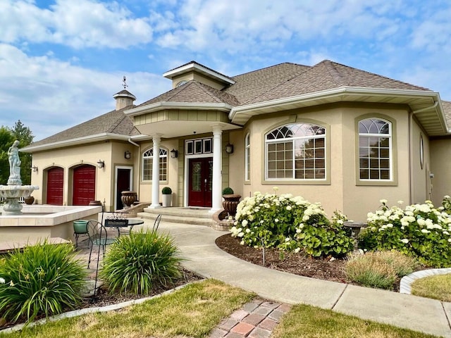 view of front of home with a garage