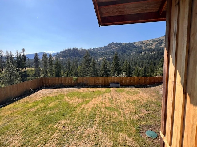 3705 Hope Way, Kettle Falls, WA 99141 - view of yard featuring a wooded view and a mountain view