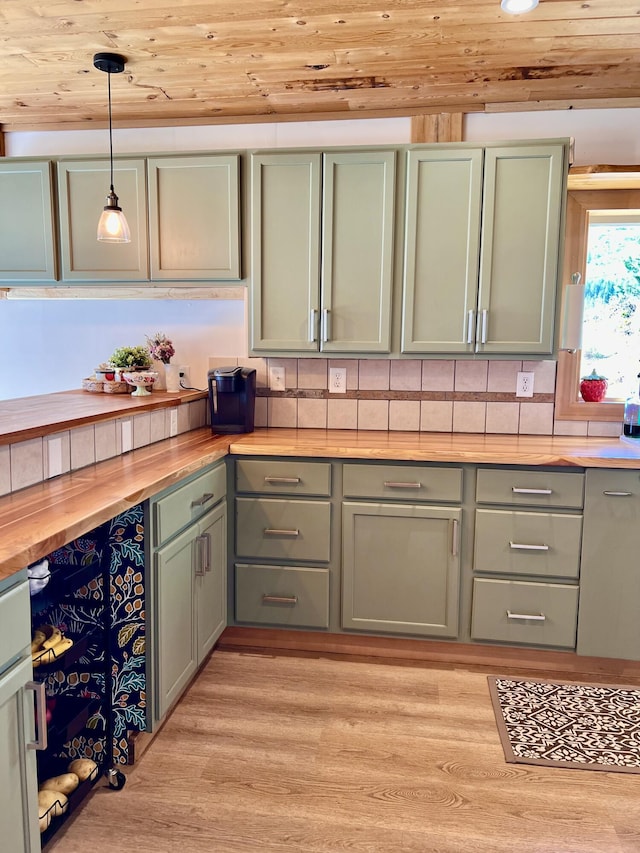 3705 Hope Way, Kettle Falls, WA 99141 - kitchen with wooden counters, green cabinets, wooden ceiling, hanging light fixtures, and light wood-style flooring