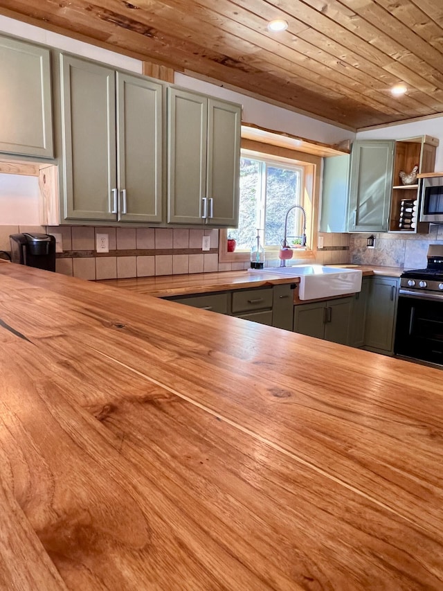 3705 Hope Way, Kettle Falls, WA 99141 - kitchen featuring appliances with stainless steel finishes, wooden counters, wooden ceiling, gray cabinetry, and a sink