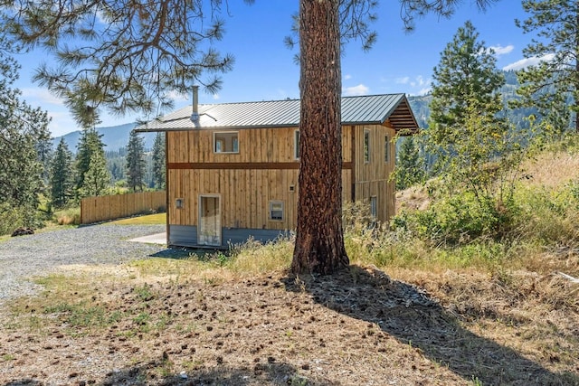 3705 Hope Way, Kettle Falls, WA 99141 - view of side of property featuring a standing seam roof and metal roof