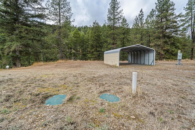 view of yard featuring a carport