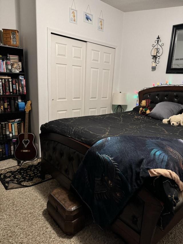 carpeted bedroom featuring a closet