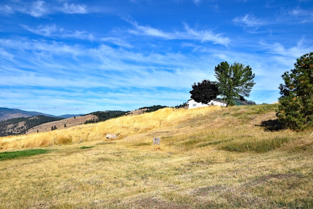 property view of mountains with a rural view