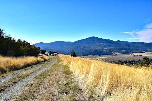 mountain view featuring a rural view