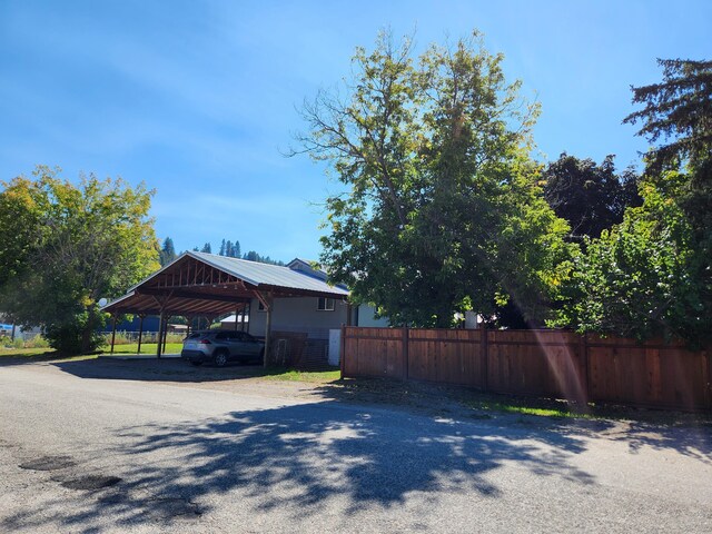 exterior space featuring a carport