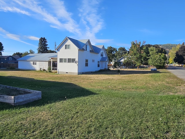 exterior space featuring a lawn