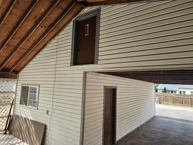 view of property exterior with a patio area