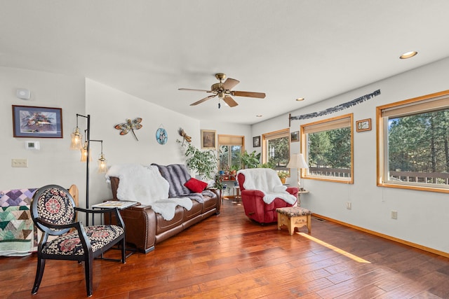 living room featuring recessed lighting, baseboards, hardwood / wood-style floors, and ceiling fan