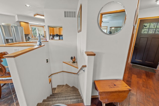 entryway featuring visible vents, recessed lighting, and dark wood-style floors