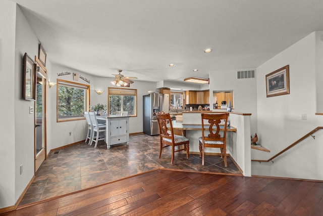 dining space with visible vents, baseboards, ceiling fan, dark wood finished floors, and recessed lighting