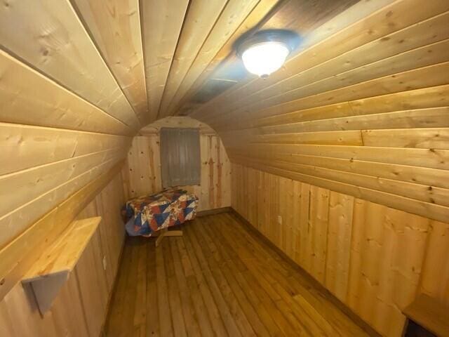 158 Teal Rd, Usk, WA 99180 - bonus room with wooden walls, dark wood-type flooring, and vaulted ceiling