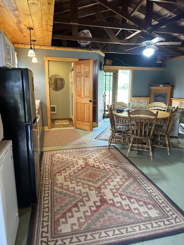 dining area featuring wooden ceiling