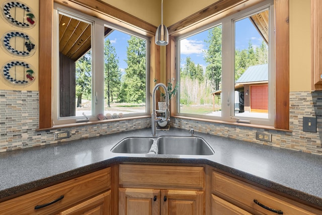 40 Happy Jack Rd, Curlew, WA 99118 - kitchen with a sink, dark countertops, healthy amount of natural light, and backsplash