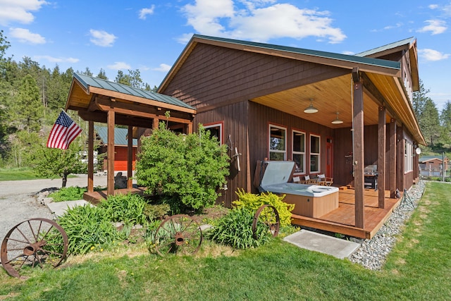 40 Happy Jack Rd, Curlew, WA 99118 - rear view of house with a deck and metal roof