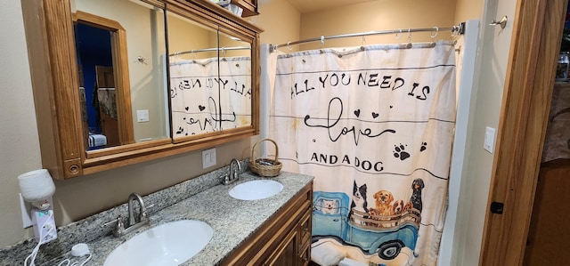 1527 Pingston Creek Rd, Kettle Falls, WA 99141 - full bathroom with a shower with curtain, double vanity, and a sink