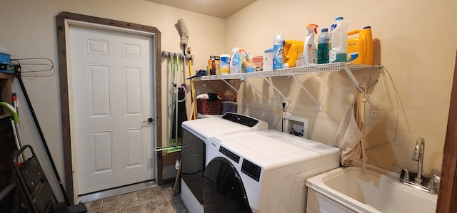 1527 Pingston Creek Rd, Kettle Falls, WA 99141 - clothes washing area with washing machine and clothes dryer, laundry area, and a sink