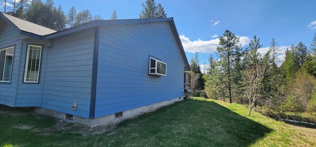 1527 Pingston Creek Rd, Kettle Falls, WA 99141 - view of property exterior featuring a lawn