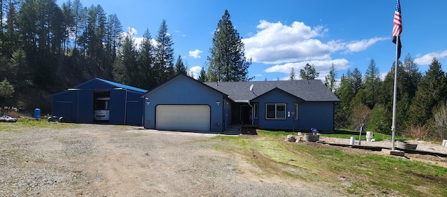 1527 Pingston Creek Rd, Kettle Falls, WA 99141 - single story home with a garage and dirt driveway
