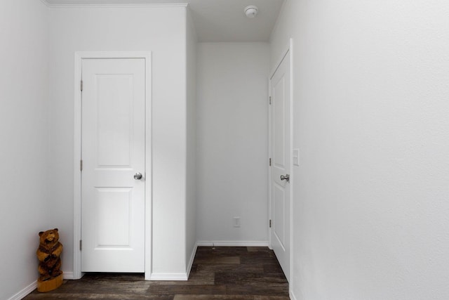 hall with dark wood-type flooring