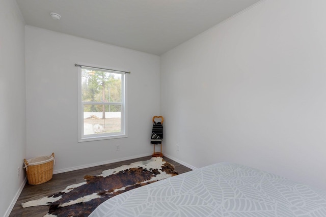 bedroom featuring hardwood / wood-style flooring