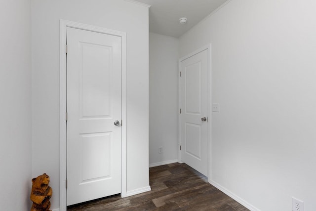 hall with dark hardwood / wood-style floors