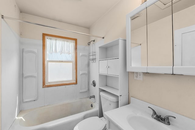 full bathroom featuring toilet, vanity, and shower / washtub combination